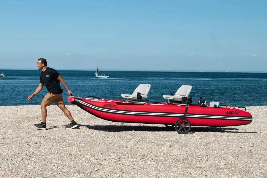 Sea Eagle New EZ Cart Heavy Duty with wide black wheels, silver axle, and coiled black strap.