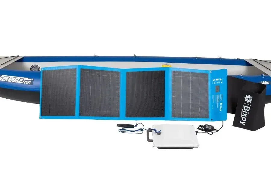Sea Eagle SUN80 Bixpy Solar Panel, blue and black, unfolded with charging accessories.