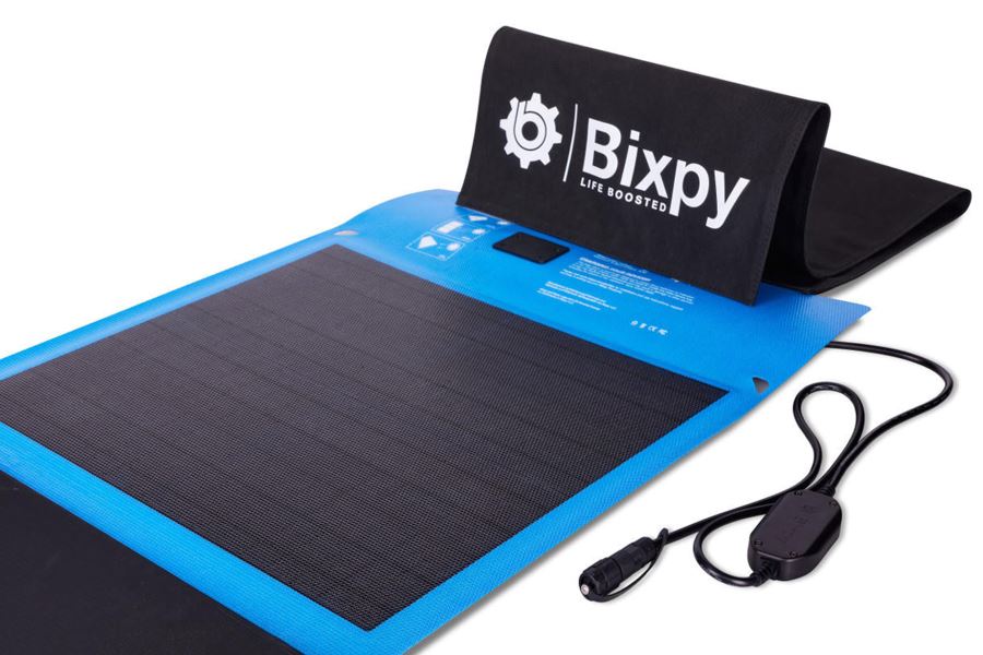 Blue and black Bixpy SUN80 solar panel, partially folded, with attached charging cable.