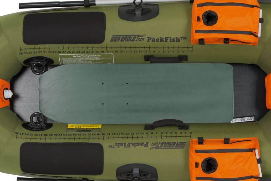 Hunter green marine plywood Sea Eagle PackFish7™ floorboard in an inflatable boat.