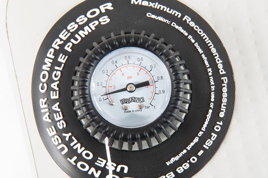 Black Sea Eagle pressure gauge with white face, red and black psi markings, and "Bravo" logo.
