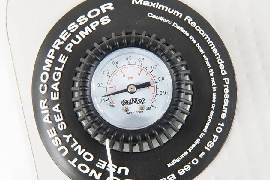 Black Sea Eagle pressure gauge with white face, red and black psi markings, and "Bravo" logo.