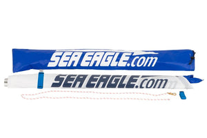 Sea Eagle QuikSail in a blue nylon carry bag and folded, white sail with "SEA EAGLE.com" logo.