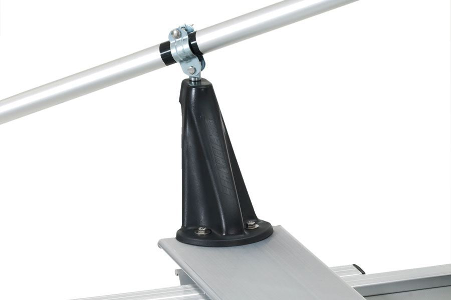 Black engineering plastic oarlock, angled for rowing, mounted on a silver boat frame with a silver oar.