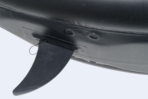 Black Sea Eagle skeg base attached to an inflatable kayak or SUP, showing the fin and mounting holes.