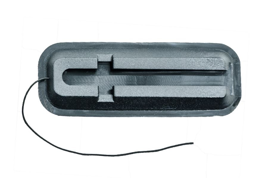 Black rectangular Sea Eagle skeg base with a central groove and attached string for SUPs and kayaks.
