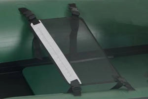Sea Eagle Stripping Apron: black mesh with white fish ruler, quick-release clips, attached to a green inflatable boat.
