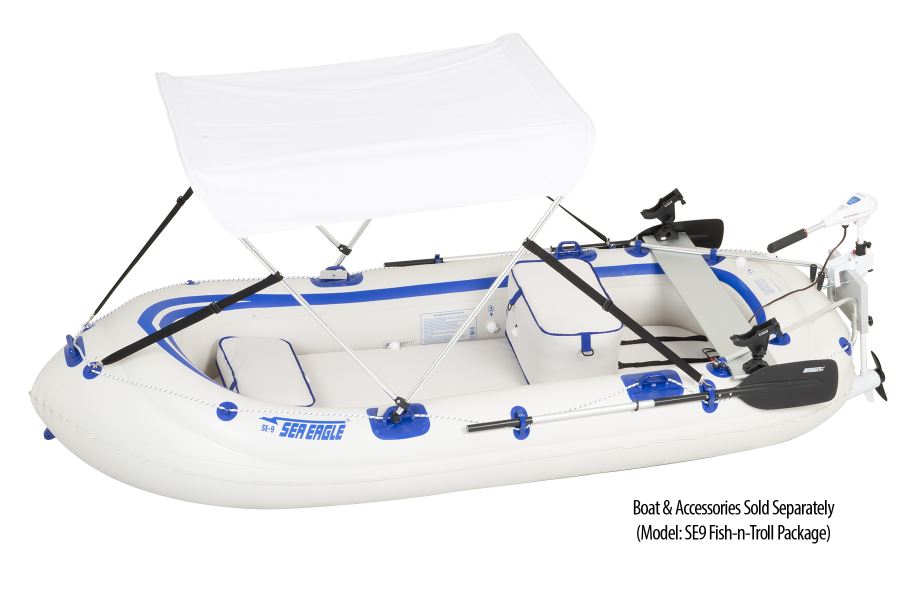 White Sea Eagle Sun &amp; Rain Canopy on an inflatable boat, with folding aluminum tubing.