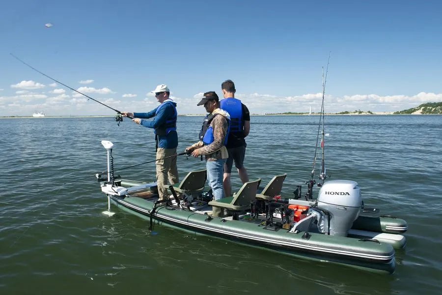Green Sea Eagle inflatable boat with two tandem locking swivel seats and 7" pedestals, carrying three anglers.