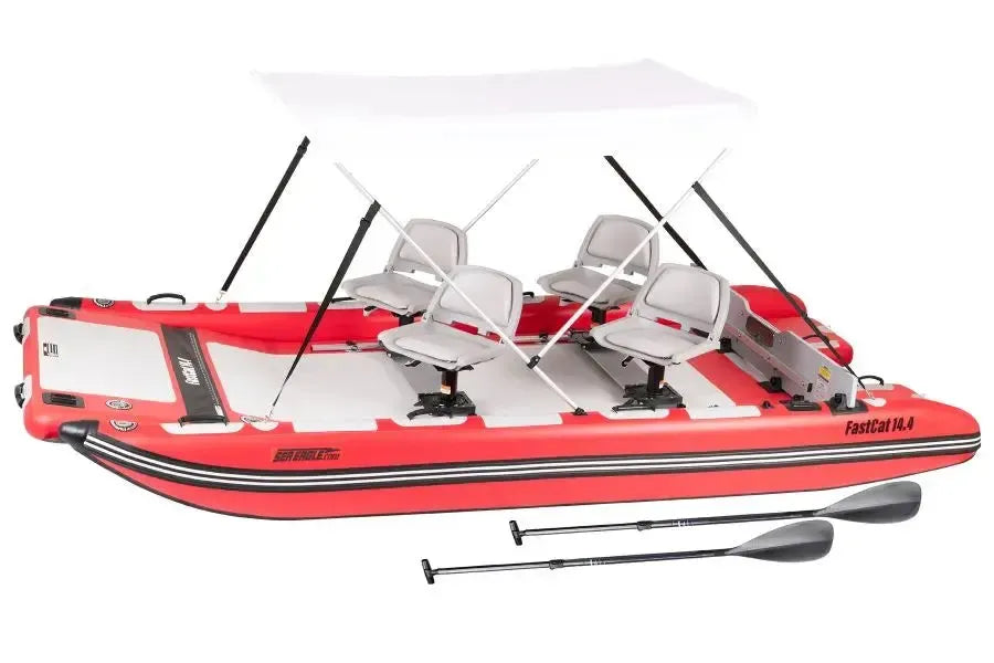 White Sea Eagle Wide Sun & Rain Canopy on an inflatable boat with blue trim and gray seat.