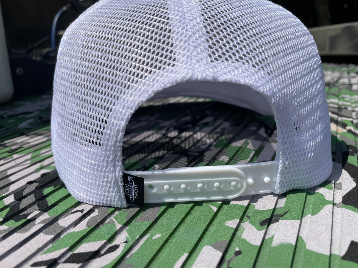 White mesh trucker hat with a snapback closure and a black "Simple Times" tag.