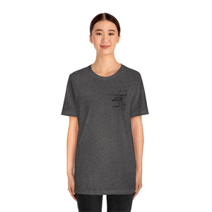 Woman in a charcoal gray cotton t-shirt with a black line art "Square Body Tiller" graphic on the left chest.