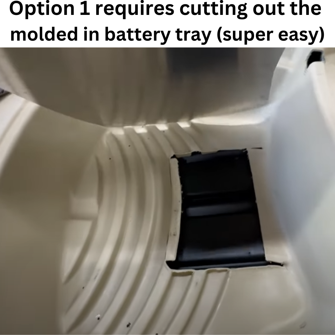 Close-up of a cream boat interior with a rectangular black cutout for a battery tray.