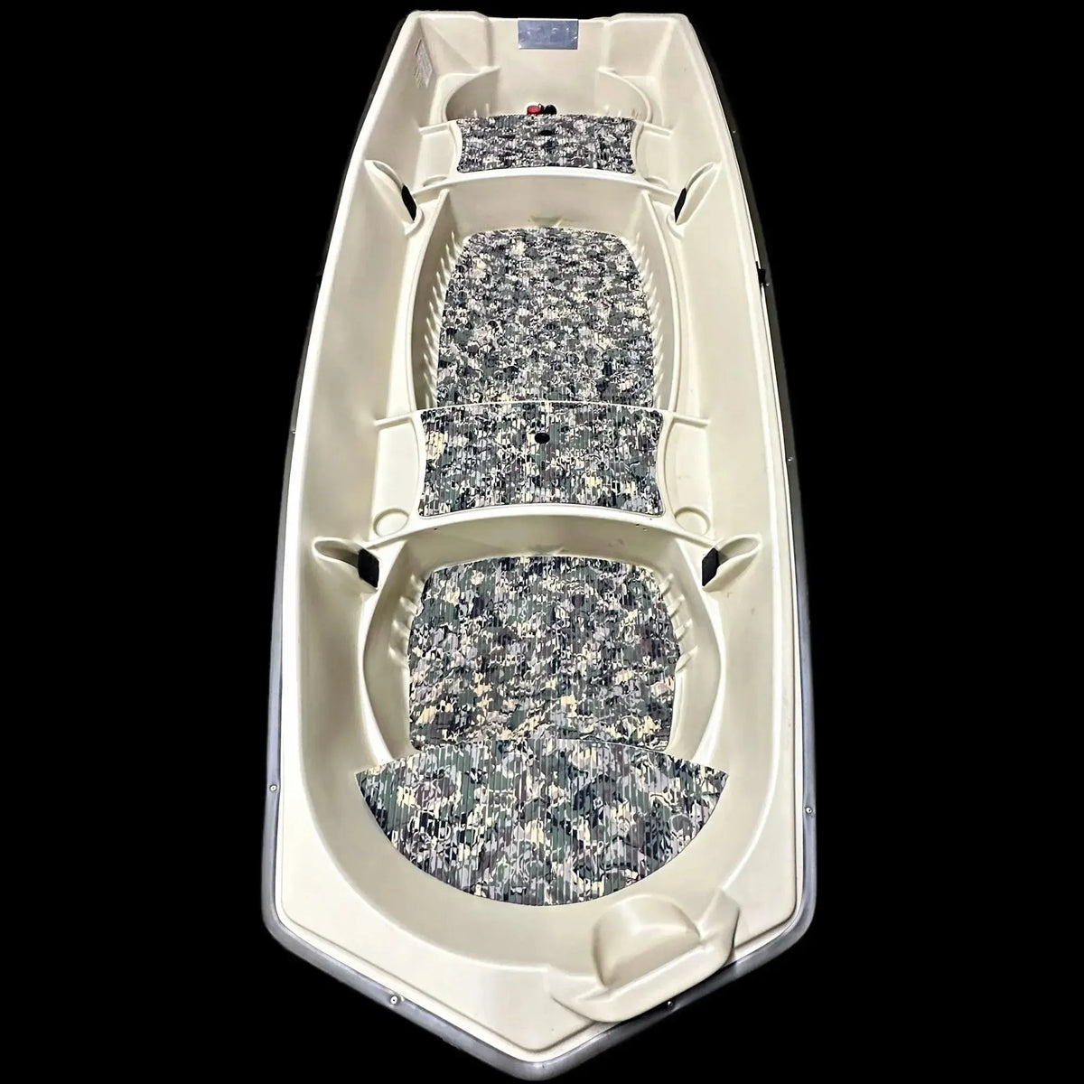 Overhead view of a beige Sun Dolphin American 12 boat with digital camo EVA foam flooring kit installed.