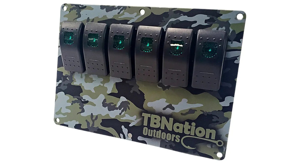 TBNation 6-gang rocker switch panel with green camouflage hydro-dipped aluminum plate and six black switches.