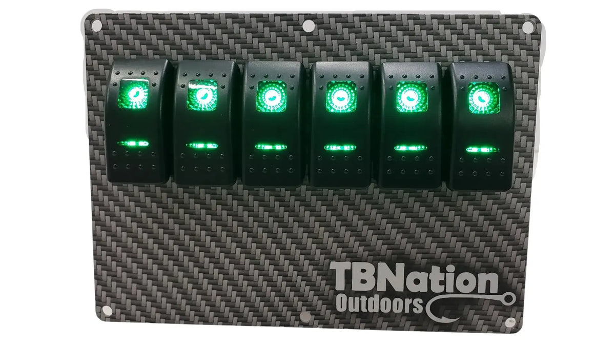 TBNation 6-gang carbon fiber hydro-dipped aluminum switch panel with six illuminated green rocker switches.