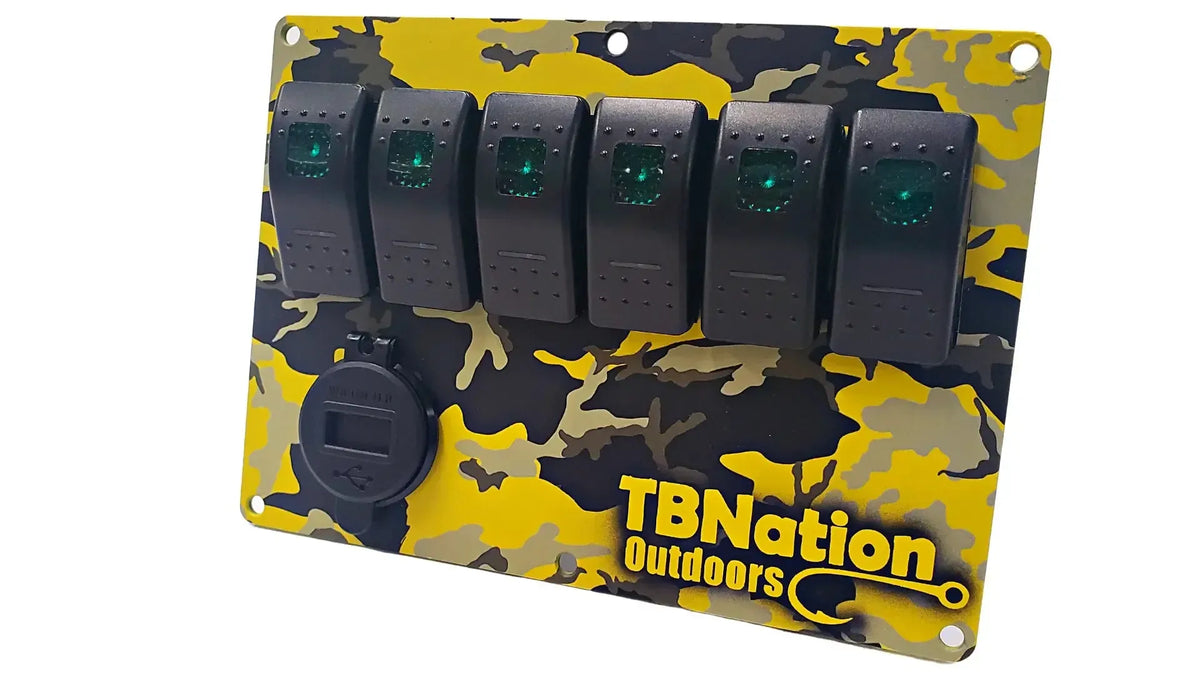 TBNation 6-gang rocker switch panel with yellow and black camouflage hydro-dipped aluminum plate, green LED switches, and USB port.