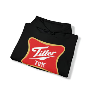 Black Tiller Time Hoodie with red and gold logo, folded, showing hood and drawstring.