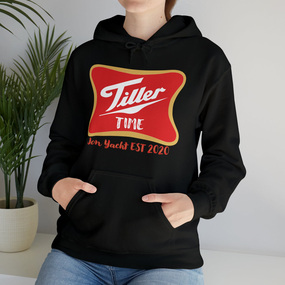 Black Tiller Time Hoodie with red and gold logo, kangaroo pocket, and drawstring hood.