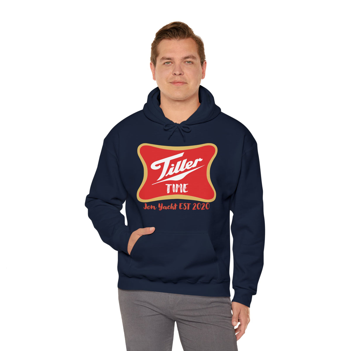 Man wearing a navy Tiller Time hoodie with a red and gold graphic, kangaroo pocket, and drawstring hood.
