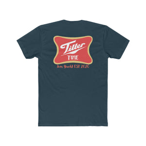 Navy blue combed cotton T-shirt with a red and gold "Tiller Time Jon Yacht EST 2020" logo on the back.