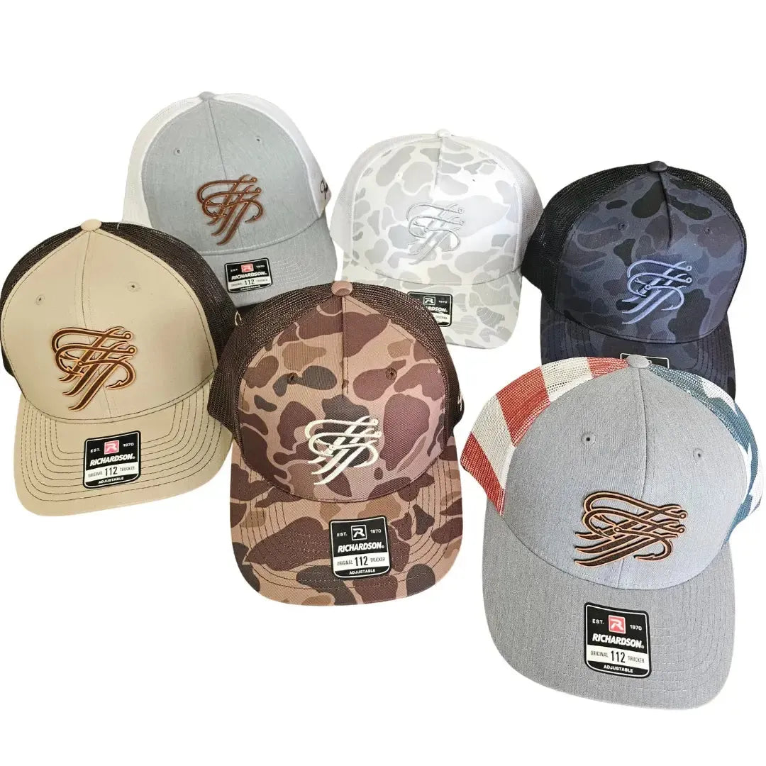 Six Richardson 112 trucker hats: tan, grey, two camo, black camo, and grey with red/white/blue stripes. All feature a "TTP" logo.