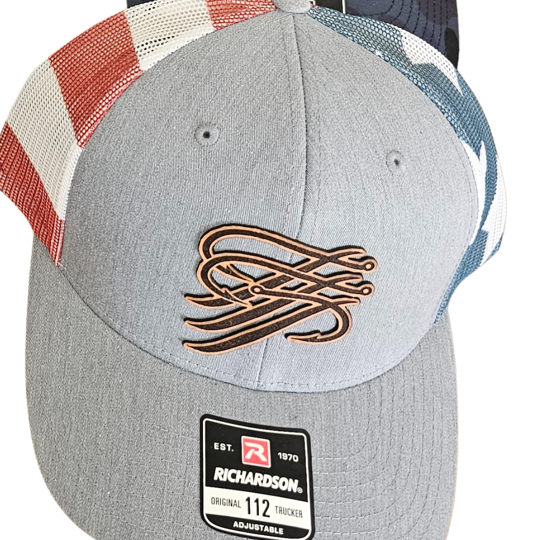 Gray Richardson 112 trucker hat with a brown TTP Outdoors logo and red, white, and blue mesh sides.