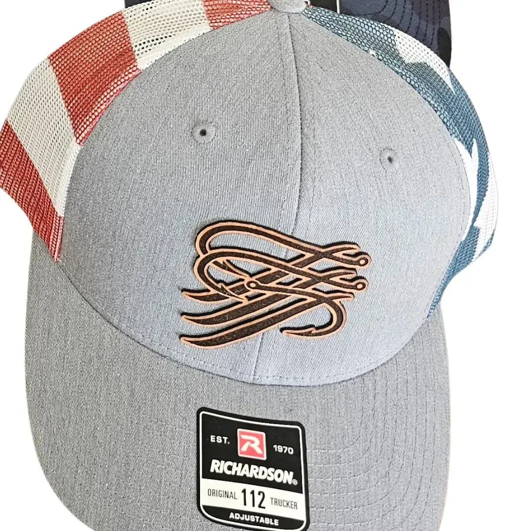 Gray Richardson 112 trucker hat with a brown TTP Outdoors logo and red, white, and blue mesh sides.