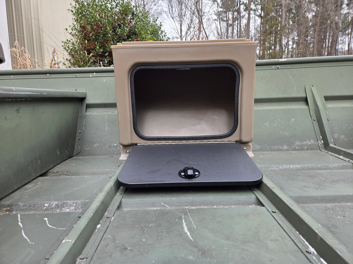 Tan universal jon boat tiller console with open black lid and latch, mounted on a green boat.