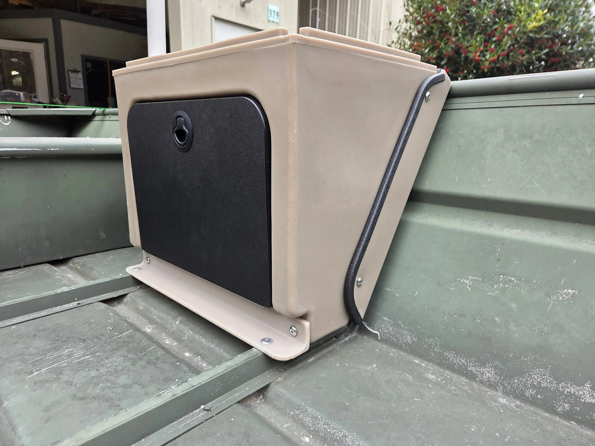 Tan universal jon boat tiller console with a black storage door, mounted in a green boat.