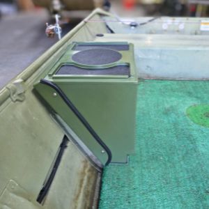Olive green Universal Jon Boat Tiller Console with black trim and textured top, installed in a boat.