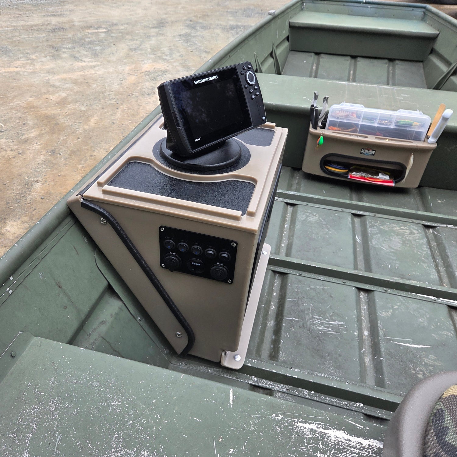 Tan Revolution Products Universal Jon Boat Tiller Console with Humminbird fish finder, black storage hatch, and switches.