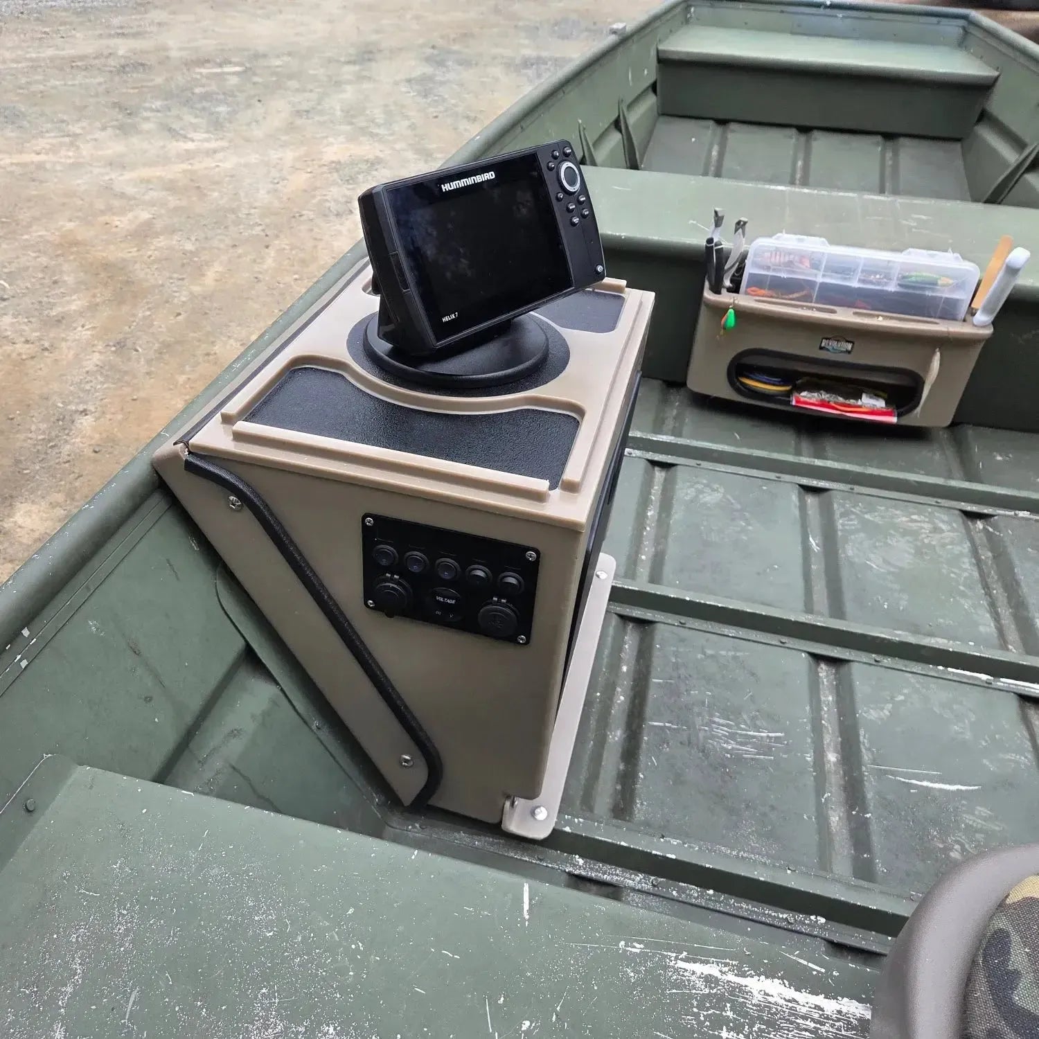 Tan Revolution Products Universal Jon Boat Tiller Console with Humminbird fish finder, black storage hatch, and switches.