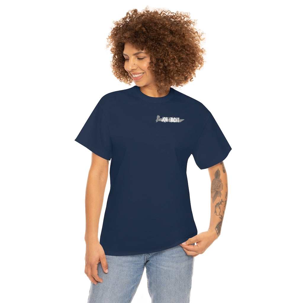 Woman wearing a navy blue 100% cotton classic fit t-shirt with a small "JON YACHT" boat graphic.
