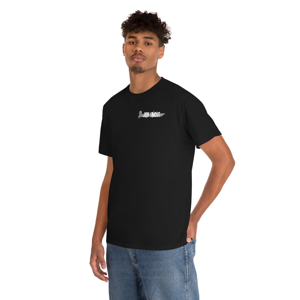 Young man wearing a black cotton "Wastin Time Heavy" classic fit tee with a small white "JON YACHT" logo.