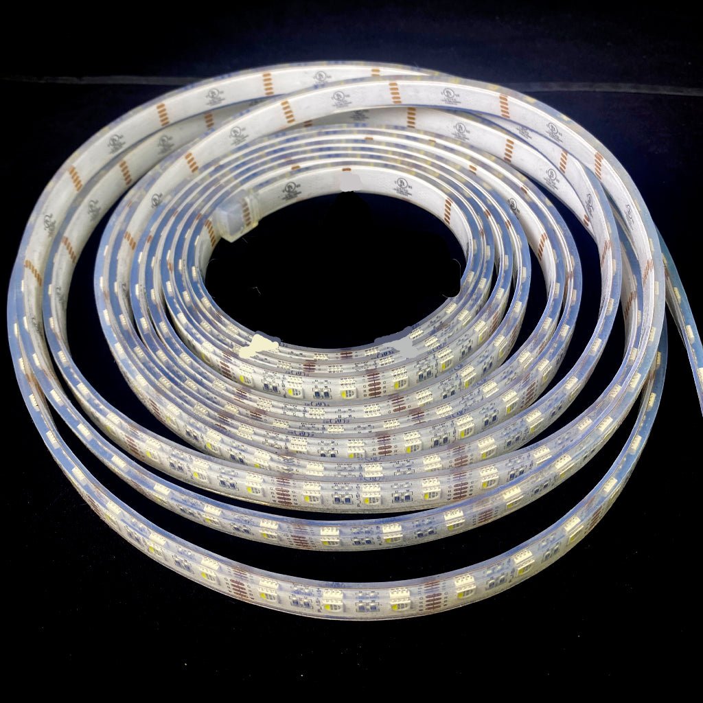 Coiled waterproof RGBW LED light strip with a clear flexible casing, showing individual multi-color LEDs.