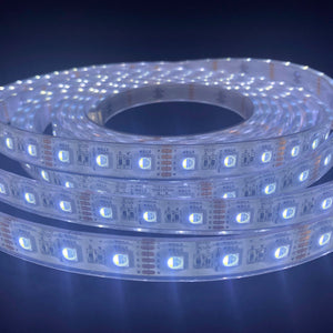 Coiled waterproof RGBW LED light strip with bright white lights, showing individual LEDs and circuit details.