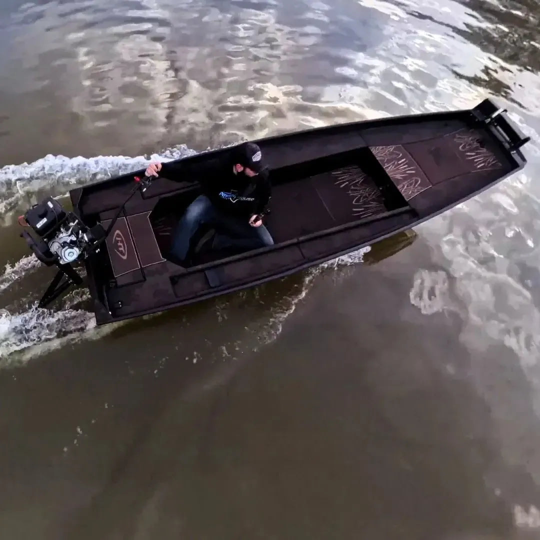 Custom espresso over black 1436 duck boat with a mud motor, driven by a person on the water.