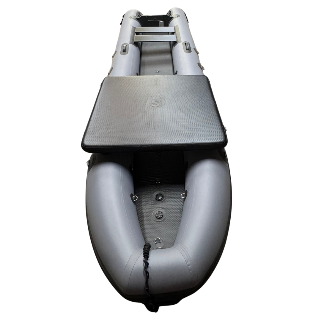 A gray inflatable dinghy boat with a black seat and a black storage lid, shown from a top-down perspective on a white background.