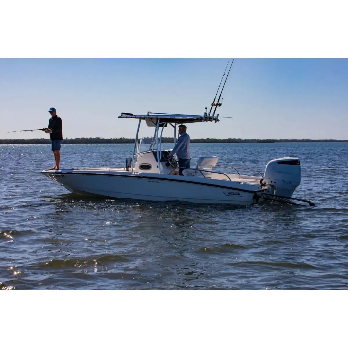 White Lewmar Axis electric shallow water anchor mounted on a Boston Whaler fishing boat.