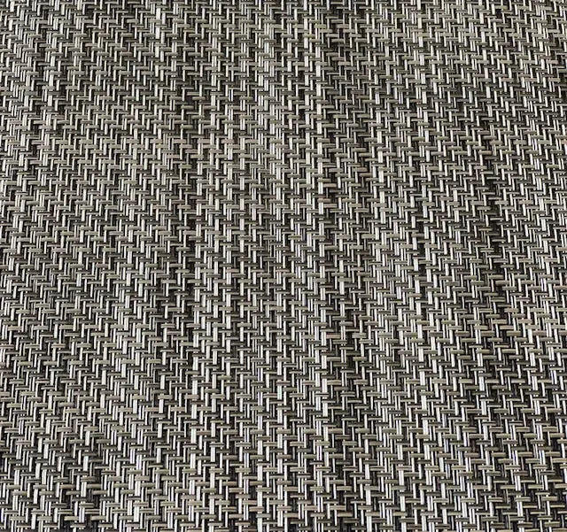 Close-up of MariDeck Ultra Premium vinyl boat flooring with a woven texture in shades of tan and black.