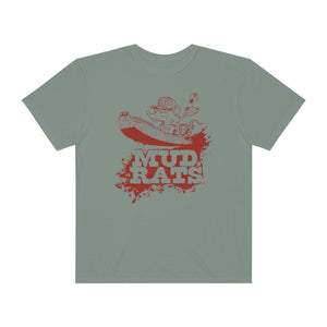 A sage green crewneck t-shirt featuring a distressed red graphic of a cartoon character in a boat with the text 'MUD RATS' underneath, displayed on a clean white background.