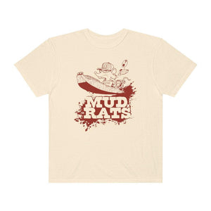 A cream-colored t-shirt with a red and brown 'Mud Rats' graphic on the front,  set against a plain white background.