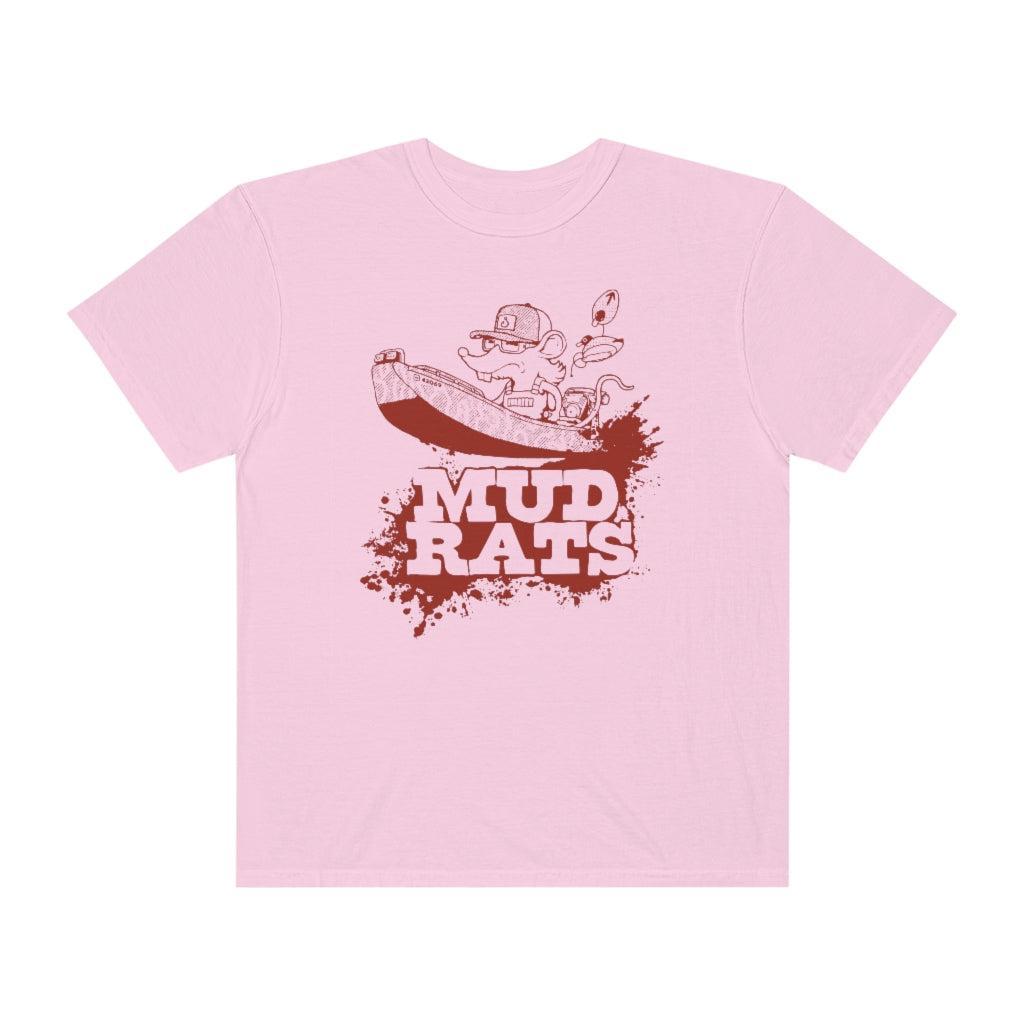 A light pink short-sleeve crewneck t-shirt featuring a dark red graphic of a cartoon character in a boat above the text 'MUD RATS' on a solid white background.