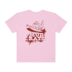 A light pink short-sleeve crewneck t-shirt featuring a dark red graphic of a cartoon character in a boat above the text 'MUD RATS' on a solid white background.