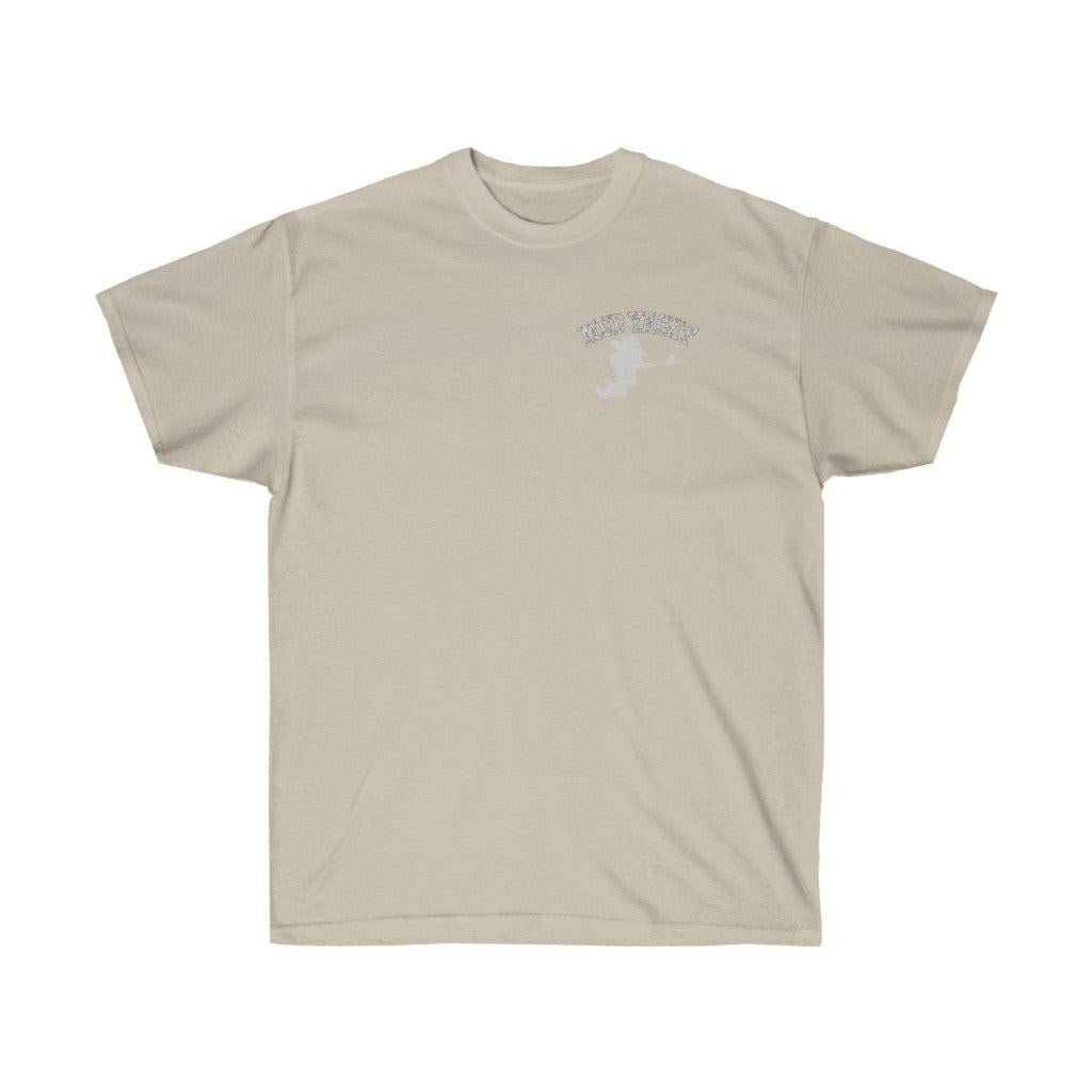 A light beige crewneck t-shirt with a small white graphic on the left chest, displayed flat against a solid white background.