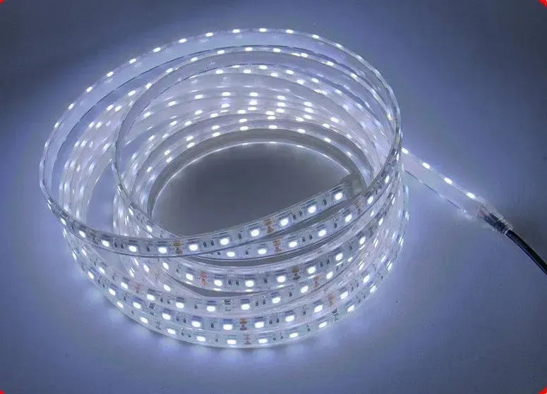 Coiled white LED light strip, flexible and waterproof, with individual bright white LEDs.