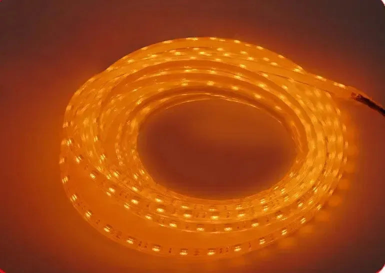 Coiled PlashLights waterproof flexible LED strips in red, white, yellow, blue, green, and purple.