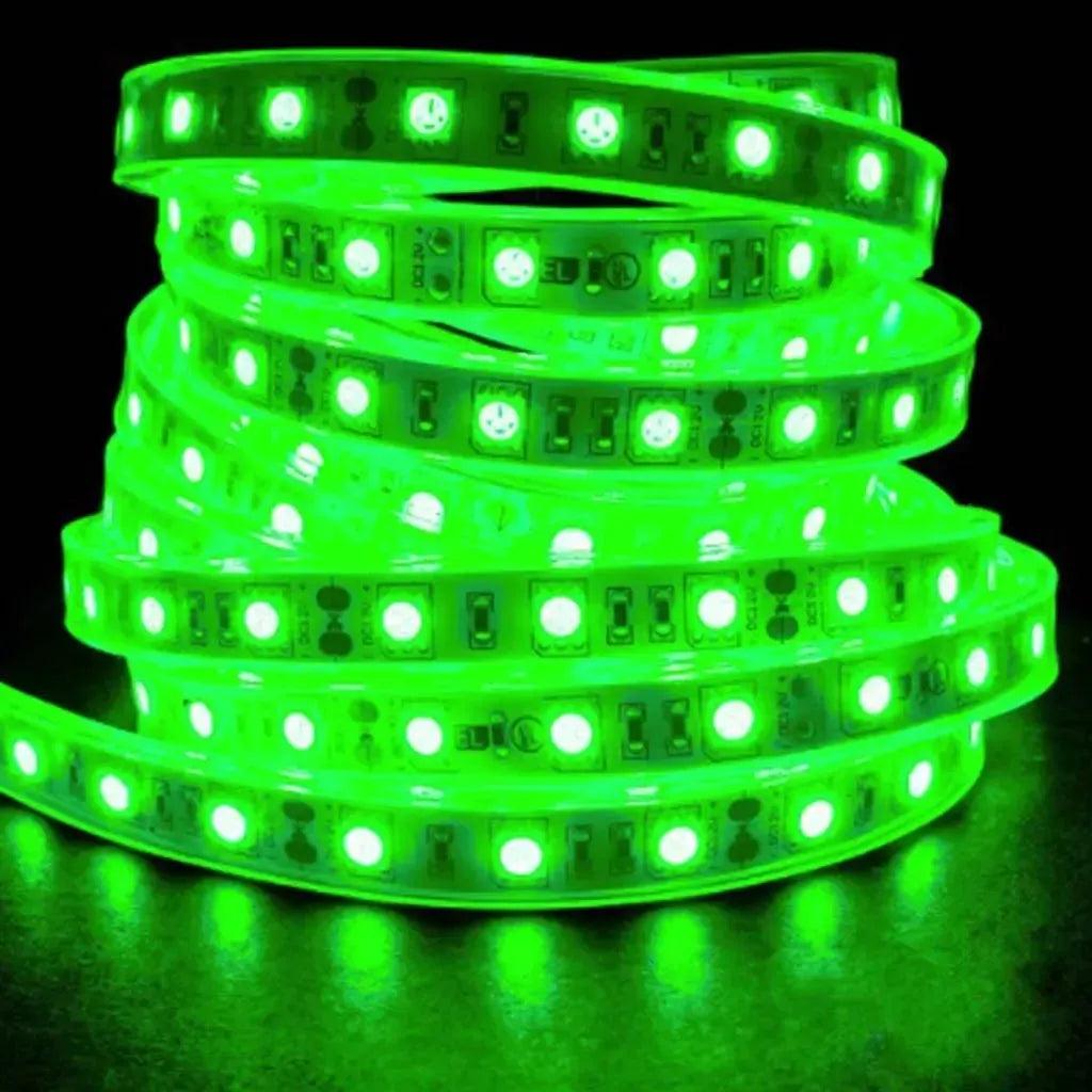 Coiled PlashLights IP68 waterproof flexible LED light strip glowing bright green on a dark background.