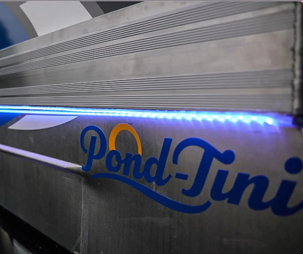 Blue Plashlight 12V RGBW flexible light strip illuminating a "Pond-Tini" boat's aluminum hull.